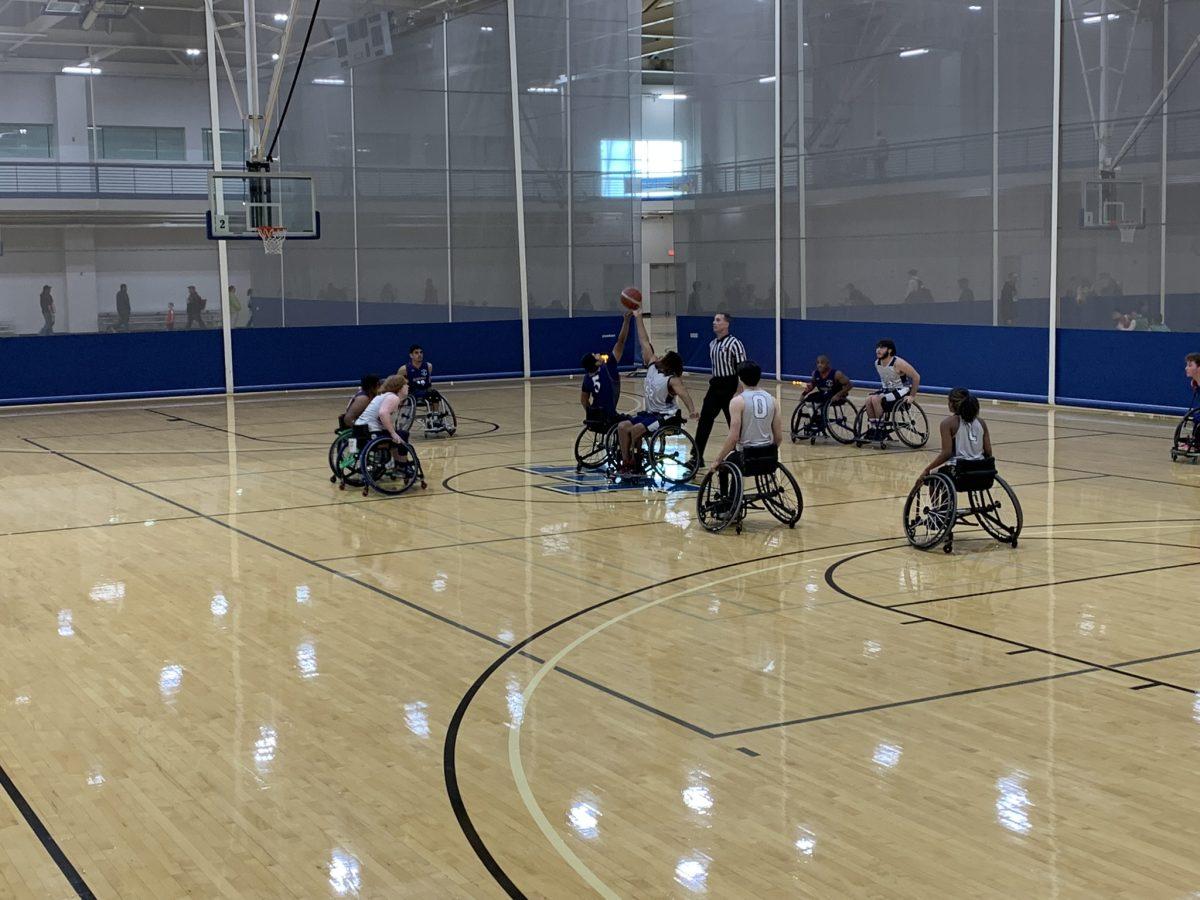 ABLE Youth athletes compete in a wheelchair basketball game at MTSU's rec center. (Photo by Nic Gomez)