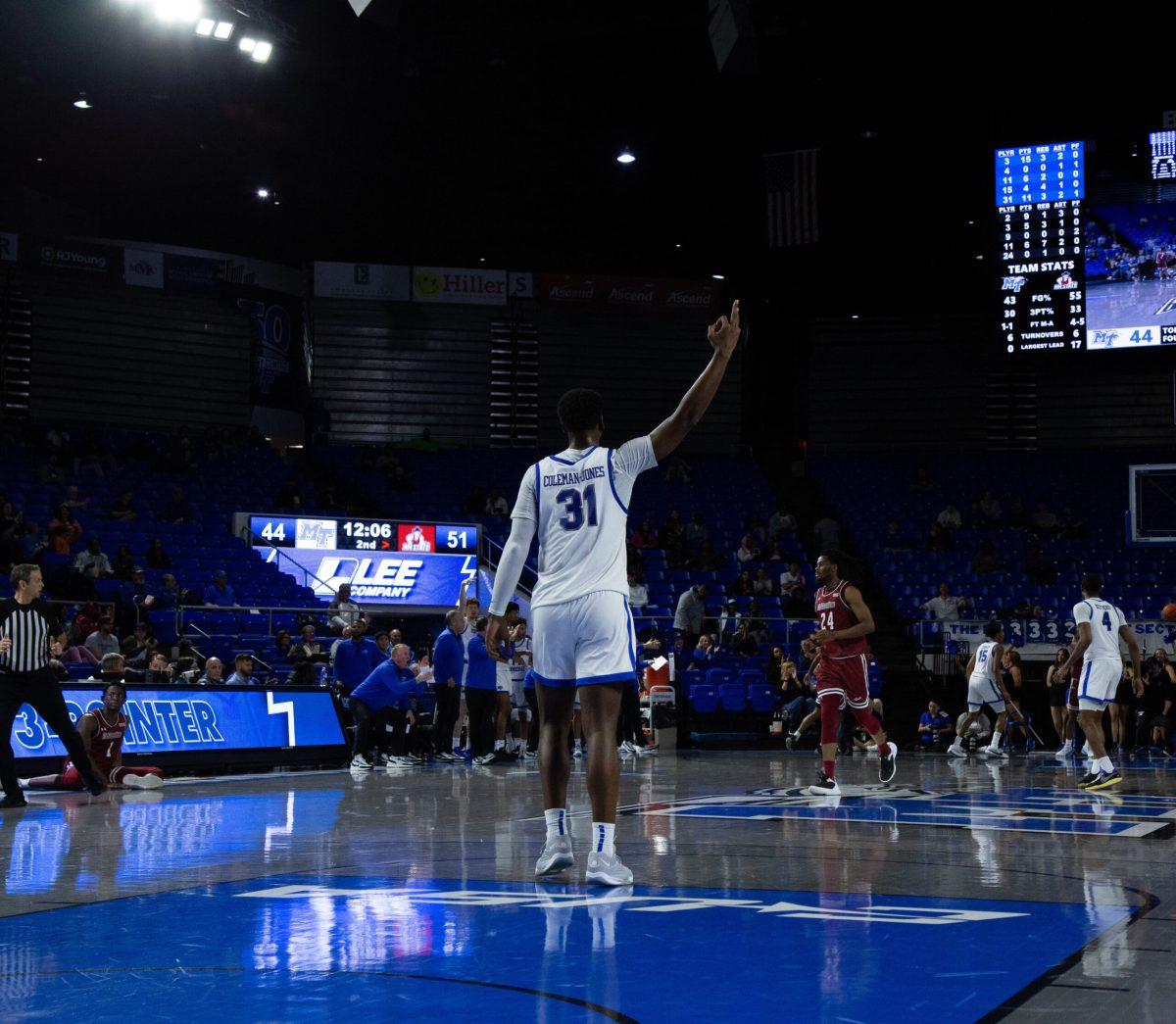 Jared Coleman-Jones celebrates after a made basket. (Photo by Preston Todd)