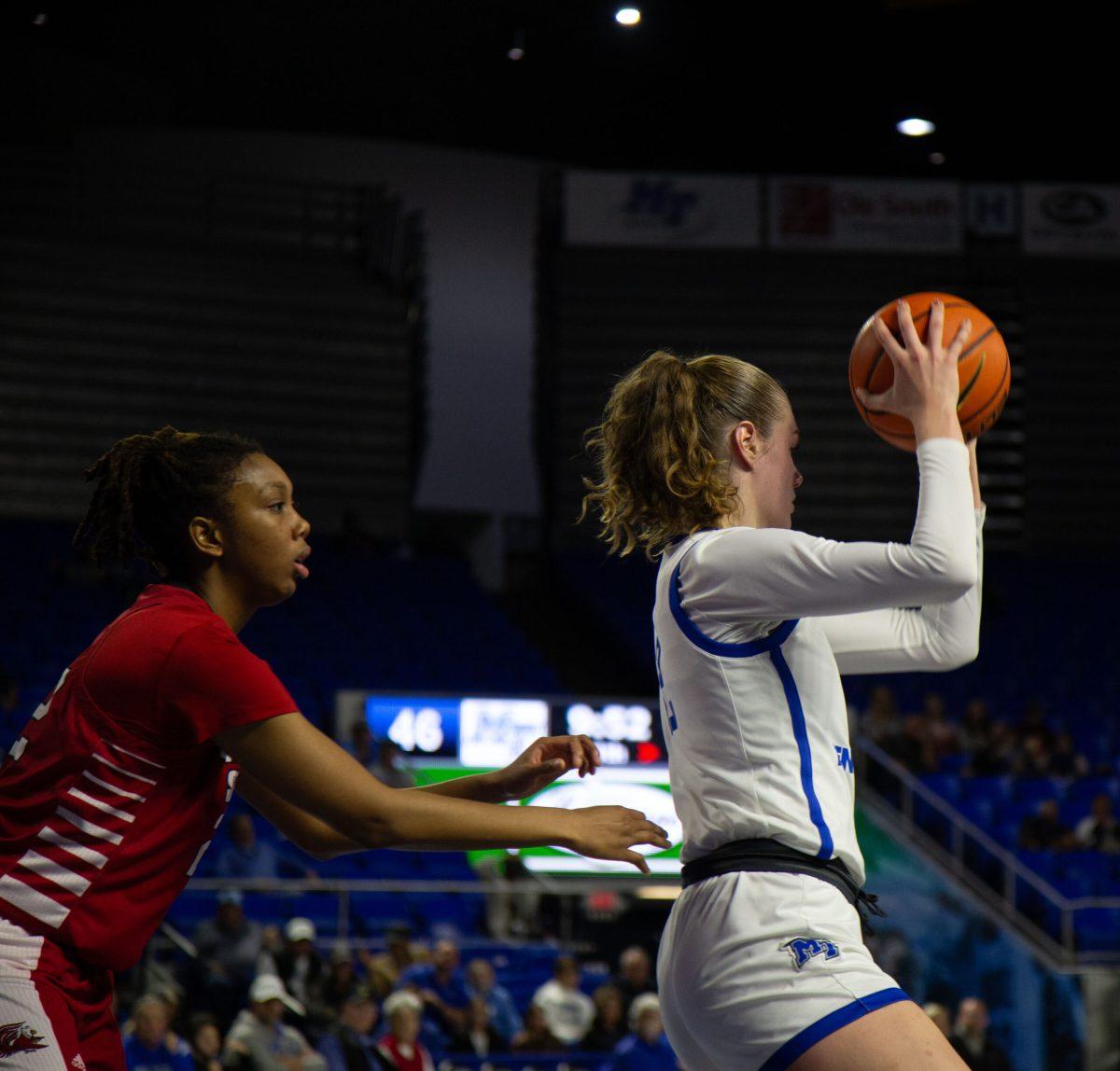 Anastasiia Boldyreva protects the ball against Jacksonville State. (Photo by Preston Todd)