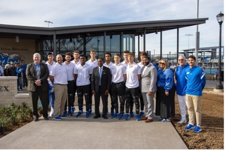 MTSU men's tennis poses in front of MTSU's new outdoor tennis facility. (Photo by Savion Davis)