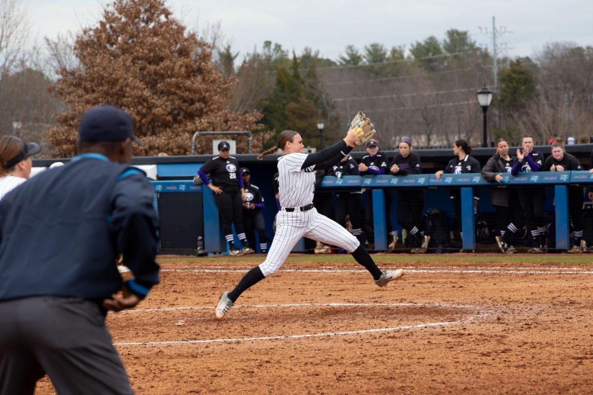 Claire Woods winds up to throw a pitch. (Photo by Preston Todd)