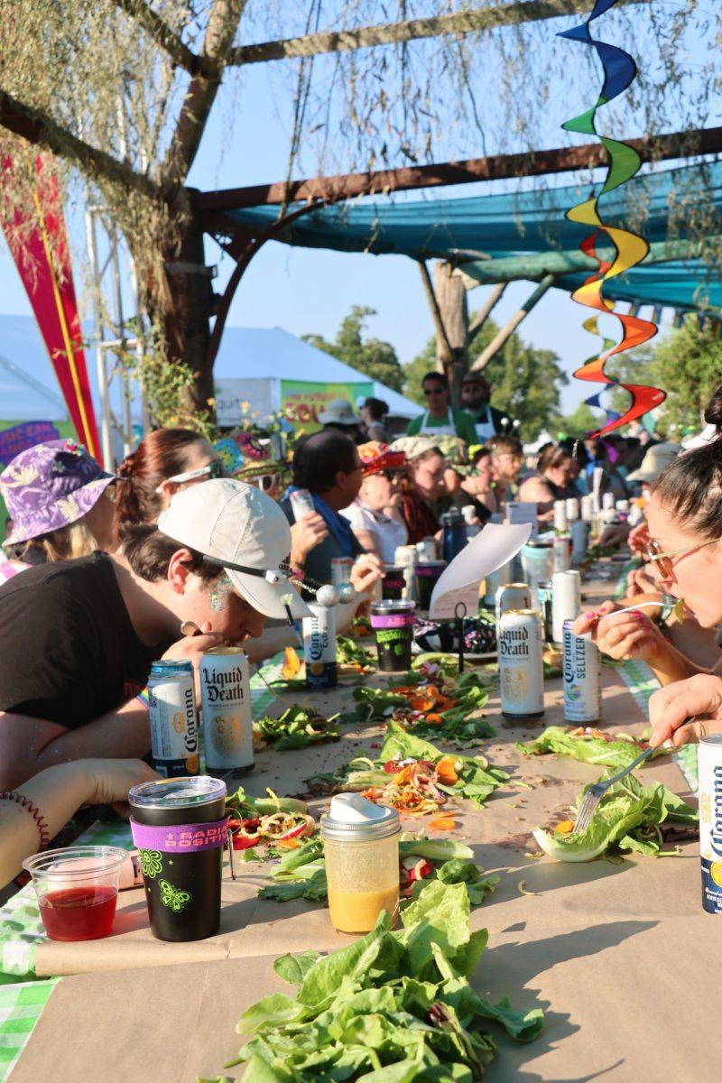 The World’s Longest Salad, an annual communal meal at Bonnaroo. (Photo: Skyler Wendell/MTSU Seigenthaler News Service) 