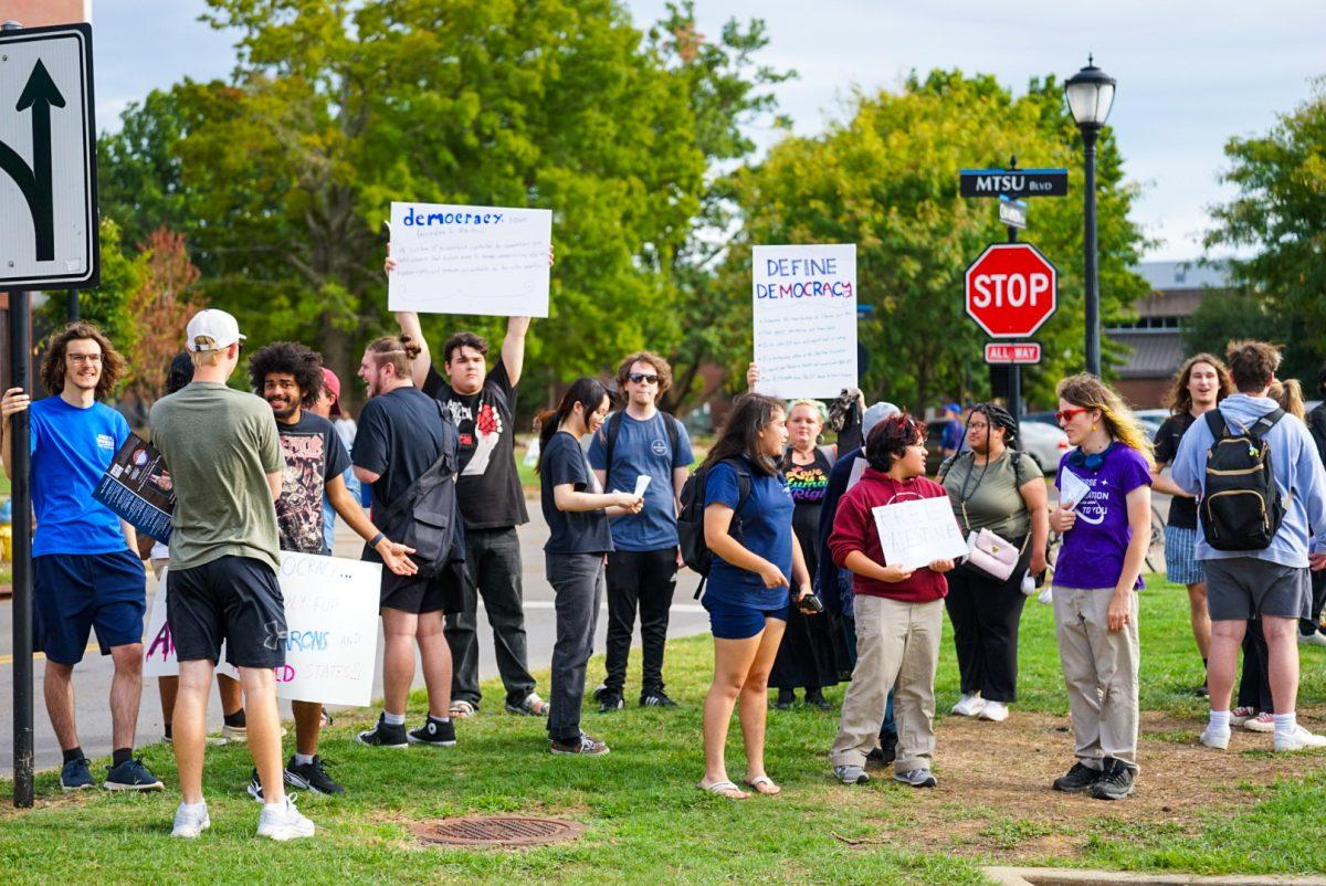 Students protested former Vice President Mike Pence's visit to MTSU for Constitution Day. (Photo by Rusty Miller)