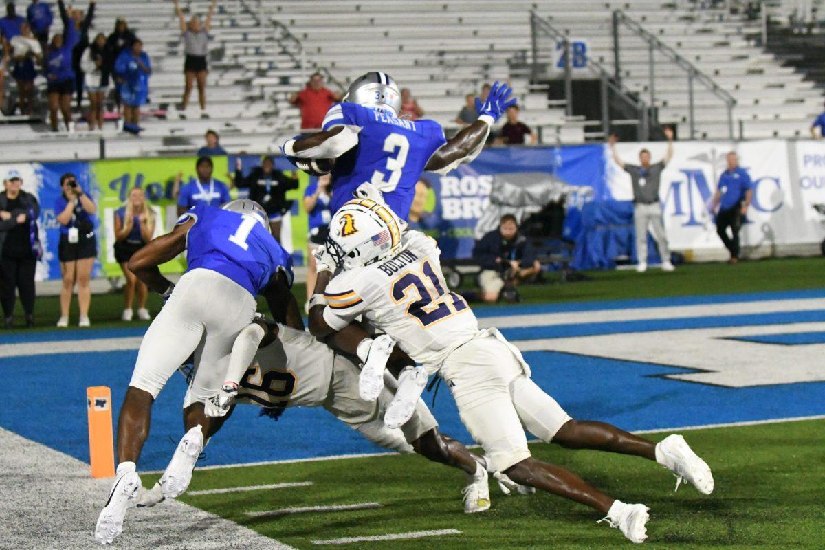 Frank Peasant dives in for the game winning touchdown against Tennessee Tech, 9-1-2024. (Photo by Erin Douglas)