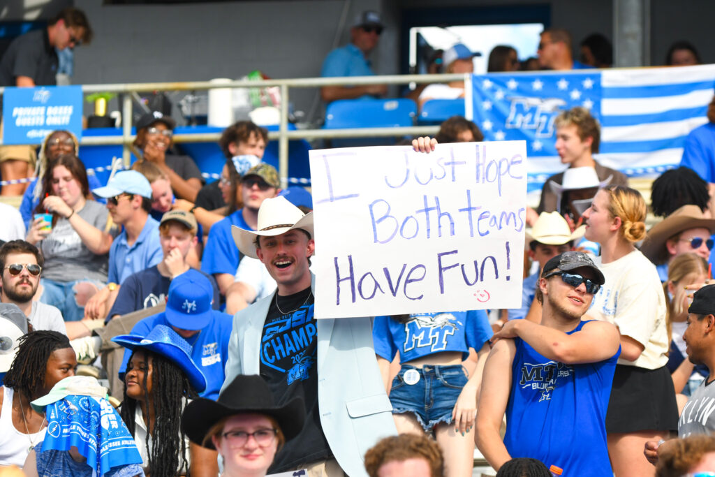 A fan with a game day sign, 9-21-2024. (Photo by Erin Douglas)