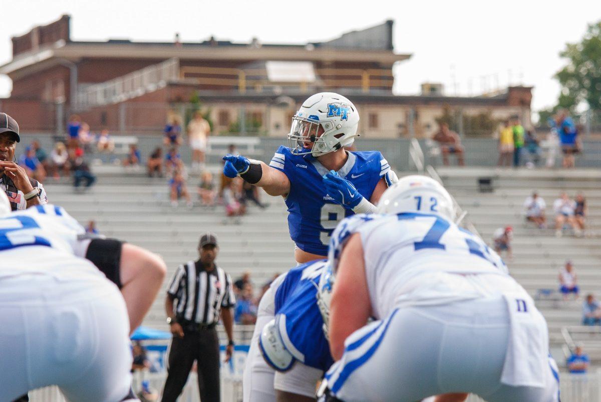 Parker Hughes directs the Blue Raider defense, 9-21-2024. (Photo by Paige Mast)