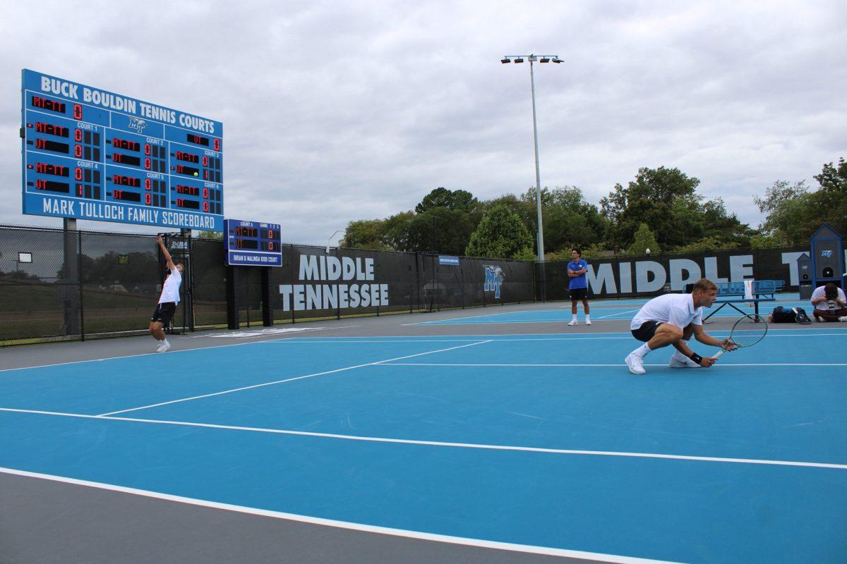 Rostislav Halfinger serves against Tennessee as Jakub Kroslak waits in his doubles stance, 9-14-2024. (Photo by Jaeda Jackson)