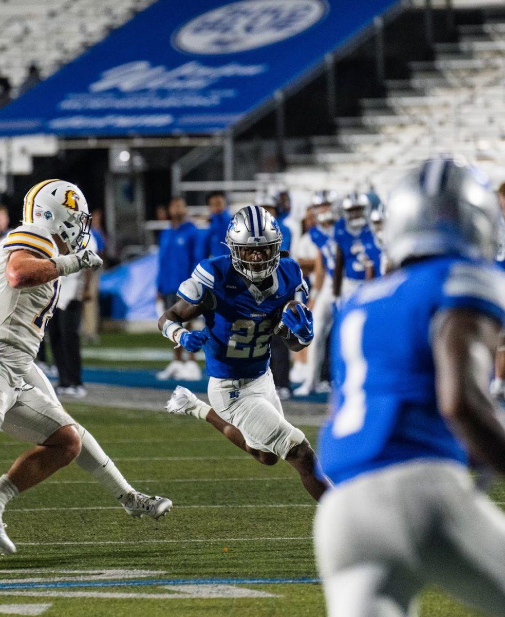 Runningback Jaiden Credle turns the corner against Tennessee Tech, 8-31-2024. (Photo by Myles Valrie)