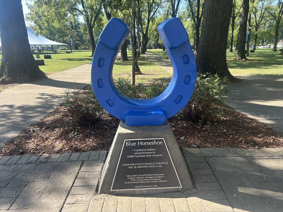 Buried under the blue horseshoe in Walnut Grove is a penny from MTSU's 1911 founding. (Photo by Siri Reynolds)