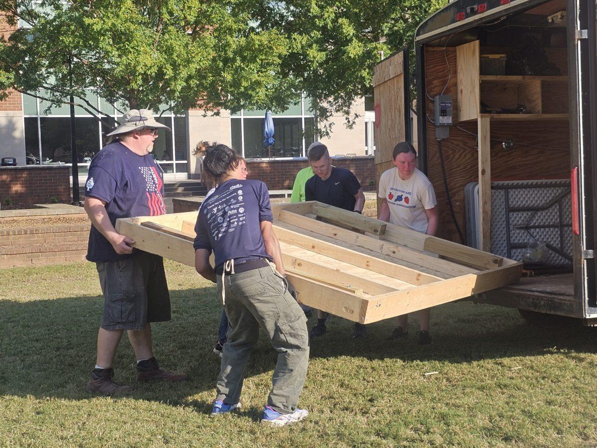 Student volunteers and Exit Realty members helped Habitat for Humanity with their yearly panel build on Oct. 3, 2024. (Photo by DeAsia Powell)