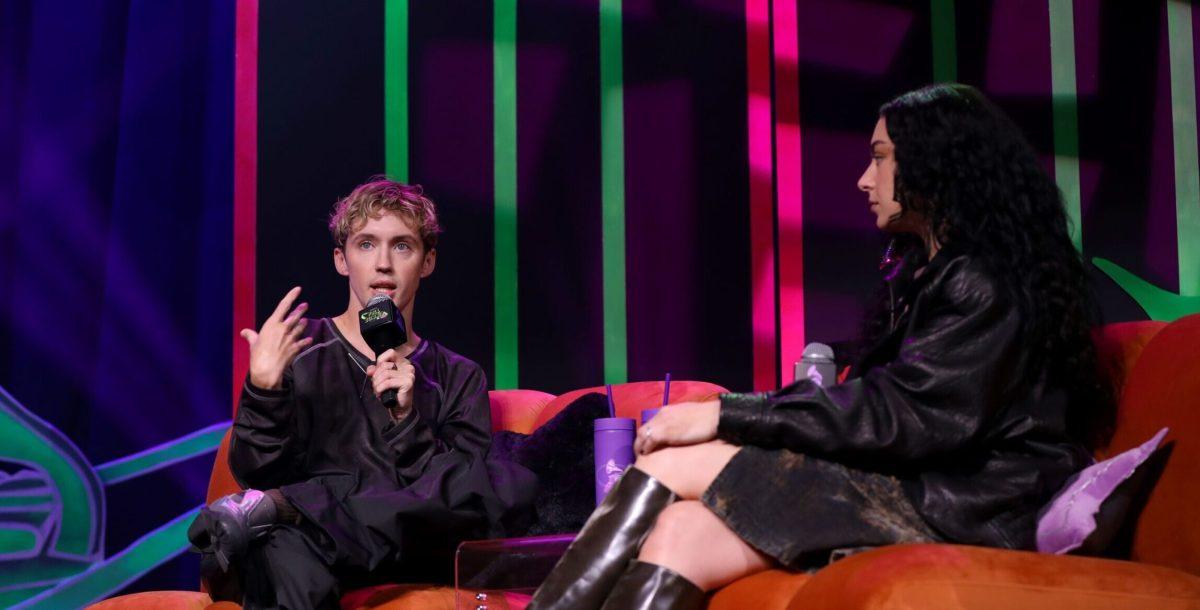 Troye Sivan and Charli XCX speak on stage during the 2024 GRAMMY U Fall Summit on October 01, 2024 in Nashville, Tennessee. (Photo by Danielle Del Valle/Getty Images for The Recording Academy)