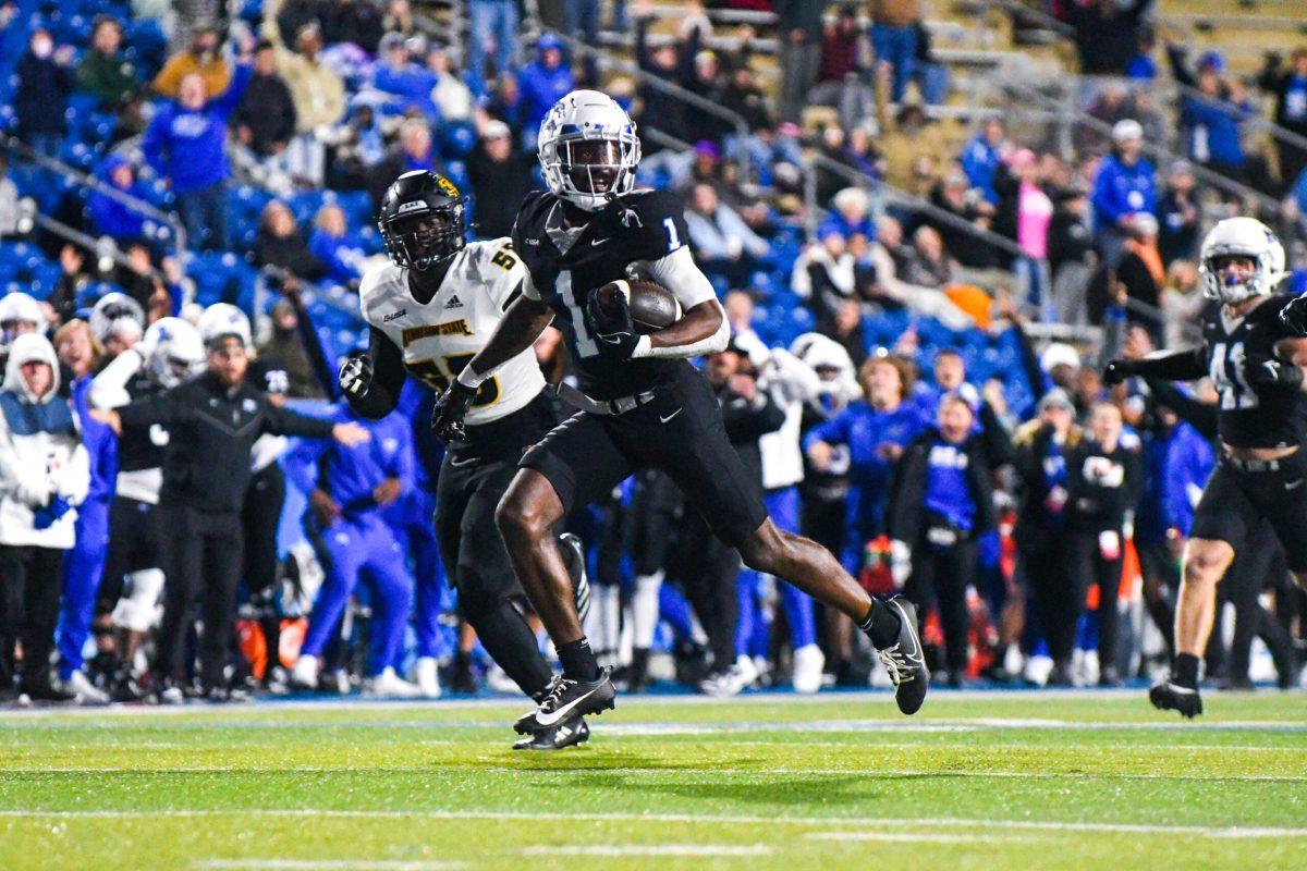 Omari Kelly returns a punt for a touchdown, 10-16-2024. (Photo by Erin Douglas)