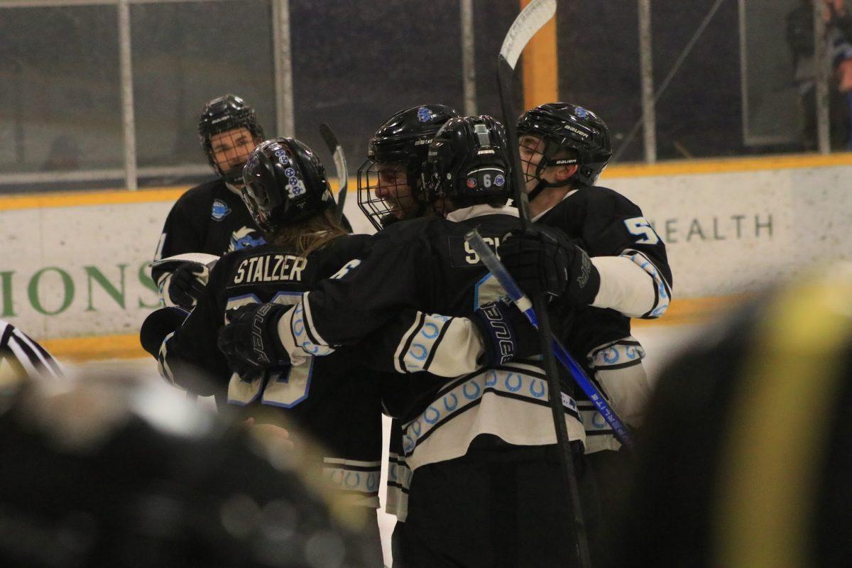 MTSU club hockey celebrates a goal against Wake Forest, 10-18-2024. (Photo by Ephraim Rodenbach)