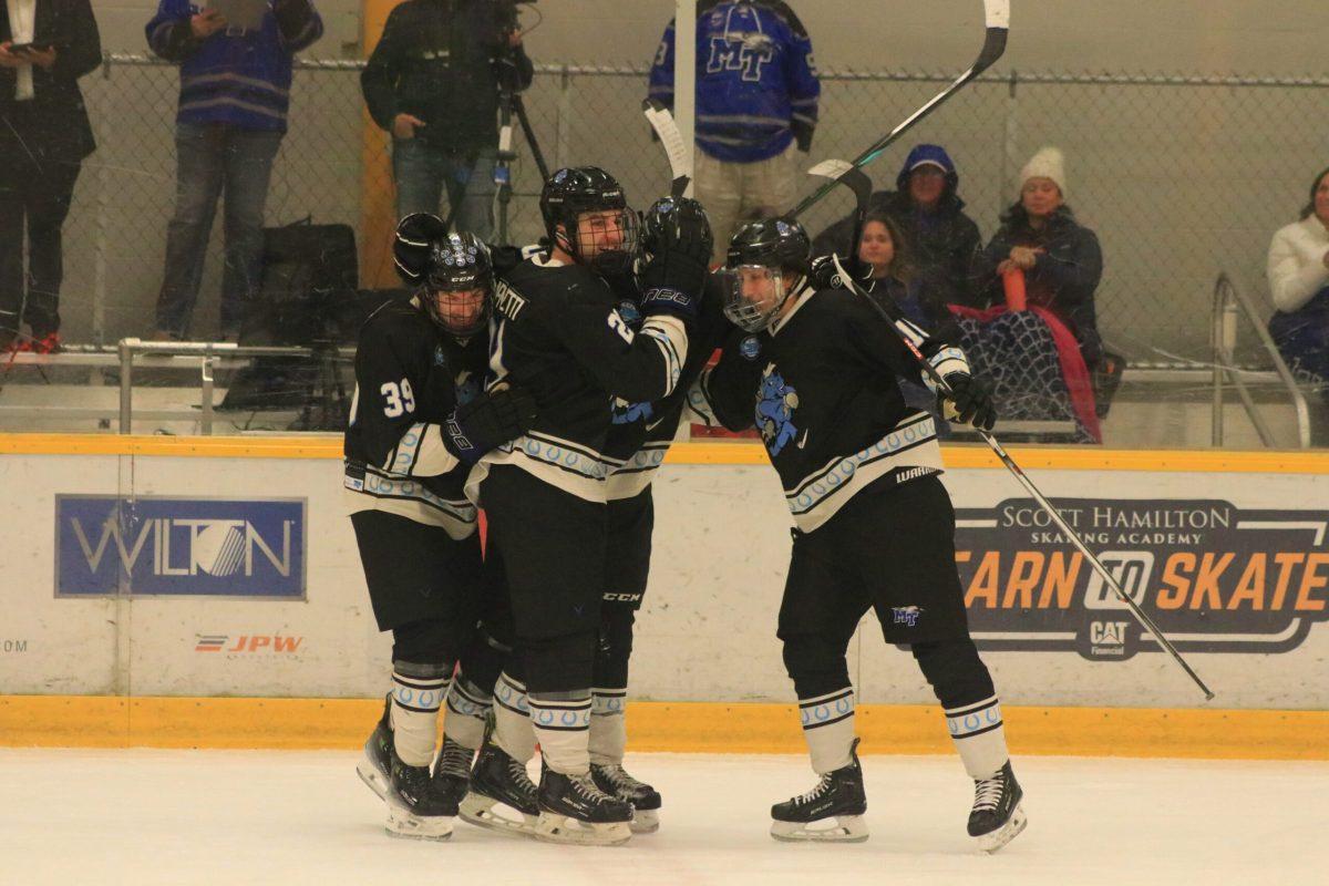 MTSU hockey celebrates a goal, 10-18-2024. (Photo by Ephraim Rodenbach)