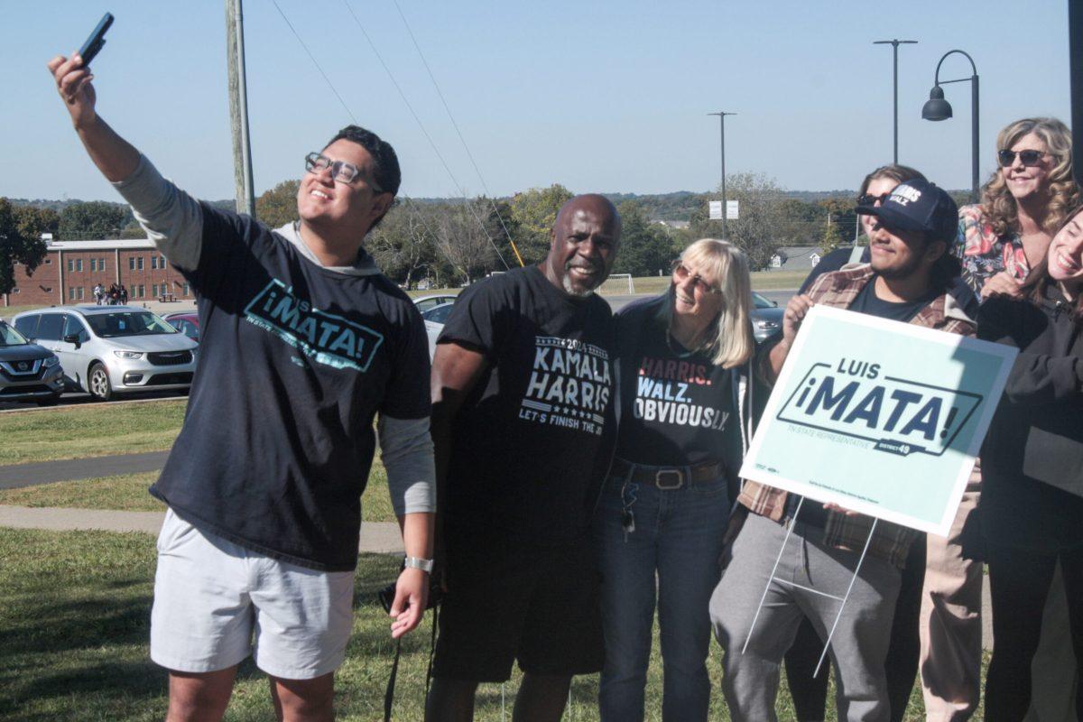 Luis Mata poses for a .5 selfie with a group of supporters in La Vergne, Tennessee, on Oct. 20, 2024. (Photo by Shauna Reynolds)