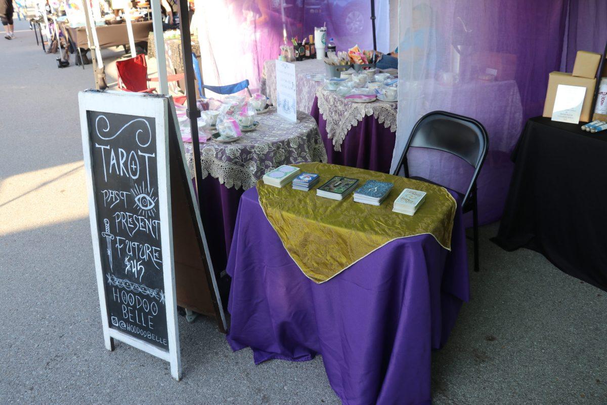 Hoodoo Belle offers tarot readings at the Nashville Pagan Pride festival on Oct. 5, 2024. (Photo by Matthew Olson)