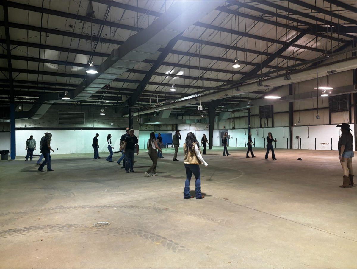 Students follow a routine at Line Dancing Night in Murfreesboro, Tennessee on Oct. 17, 2024. (Photo by Kerstie Wolaver)