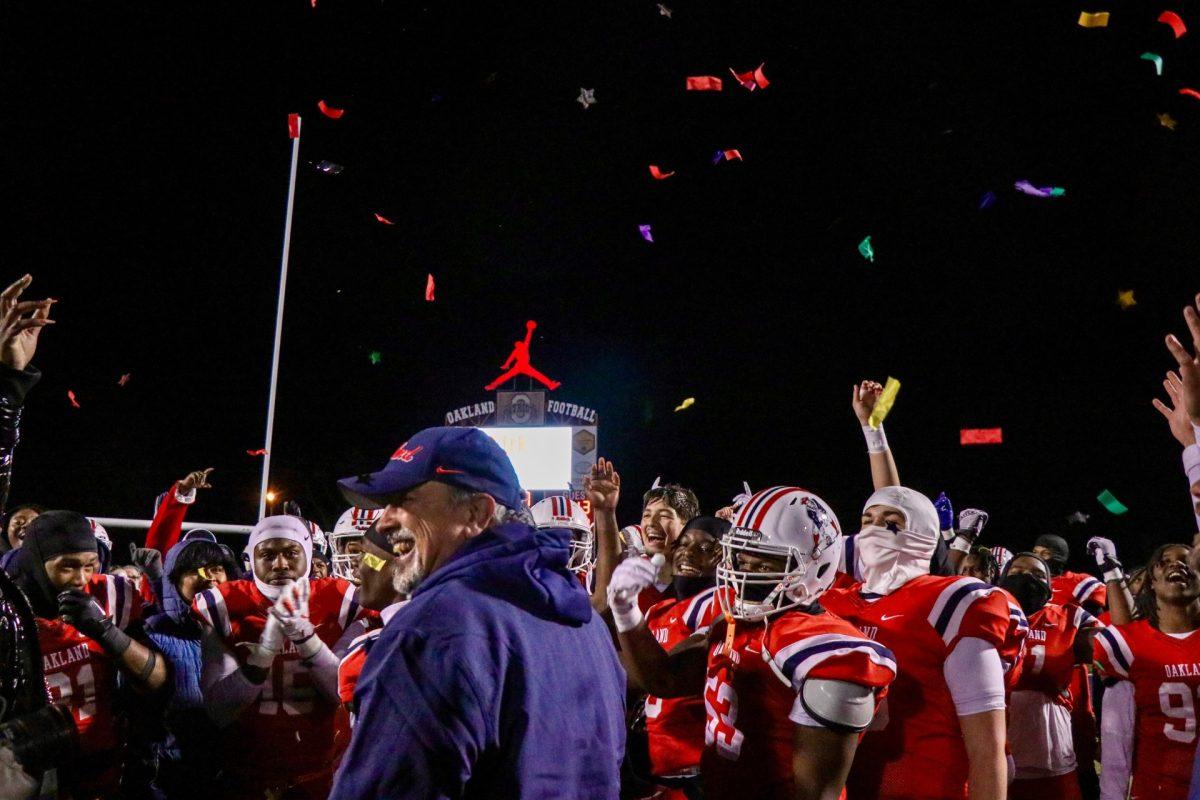 Confetti falls on Oakland as the team and its fans celebrate a state title berth, 11-29-2024. (Photo by Ephraim Rodenbach)