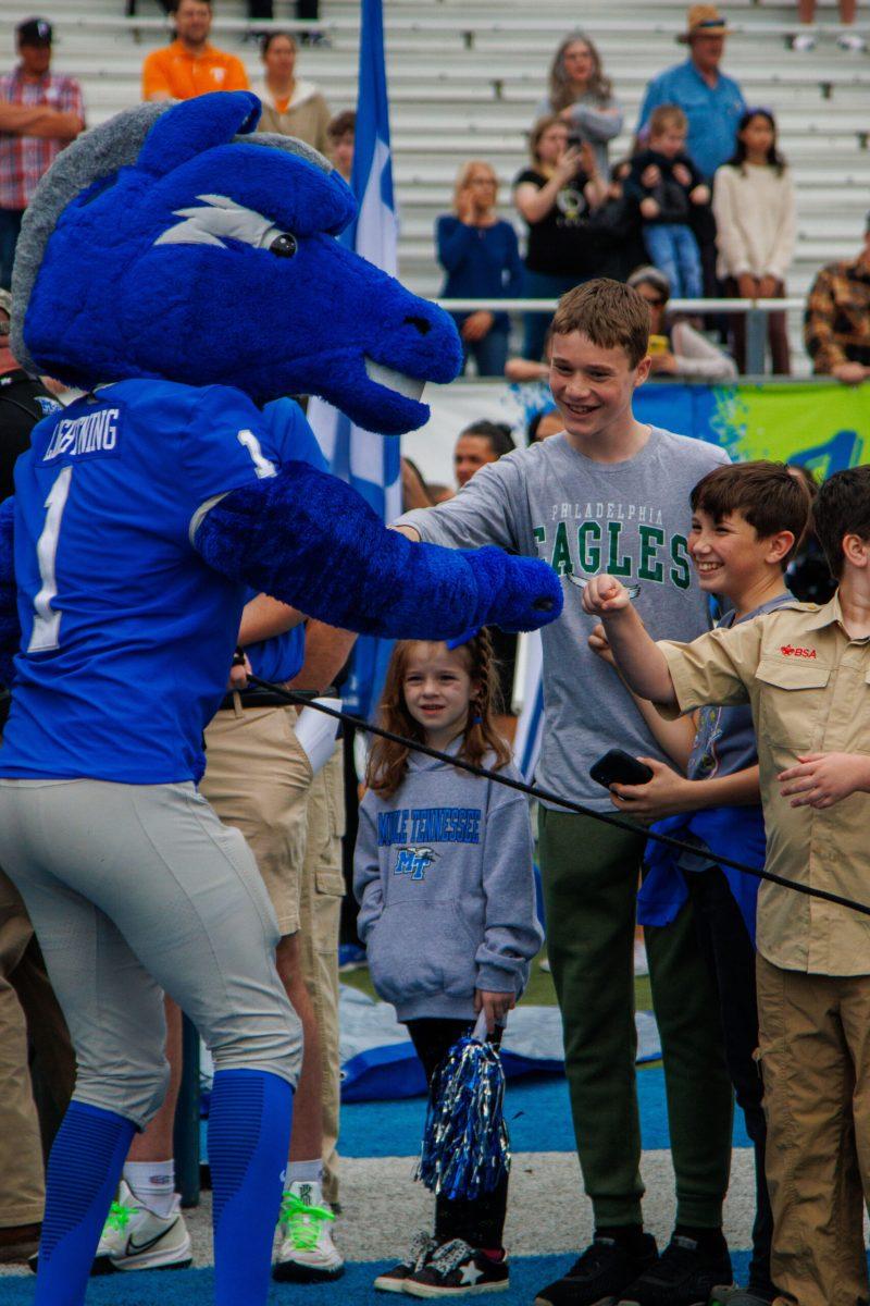 Lighting gives out high fives to local boy scout members, 11-9-2024. 