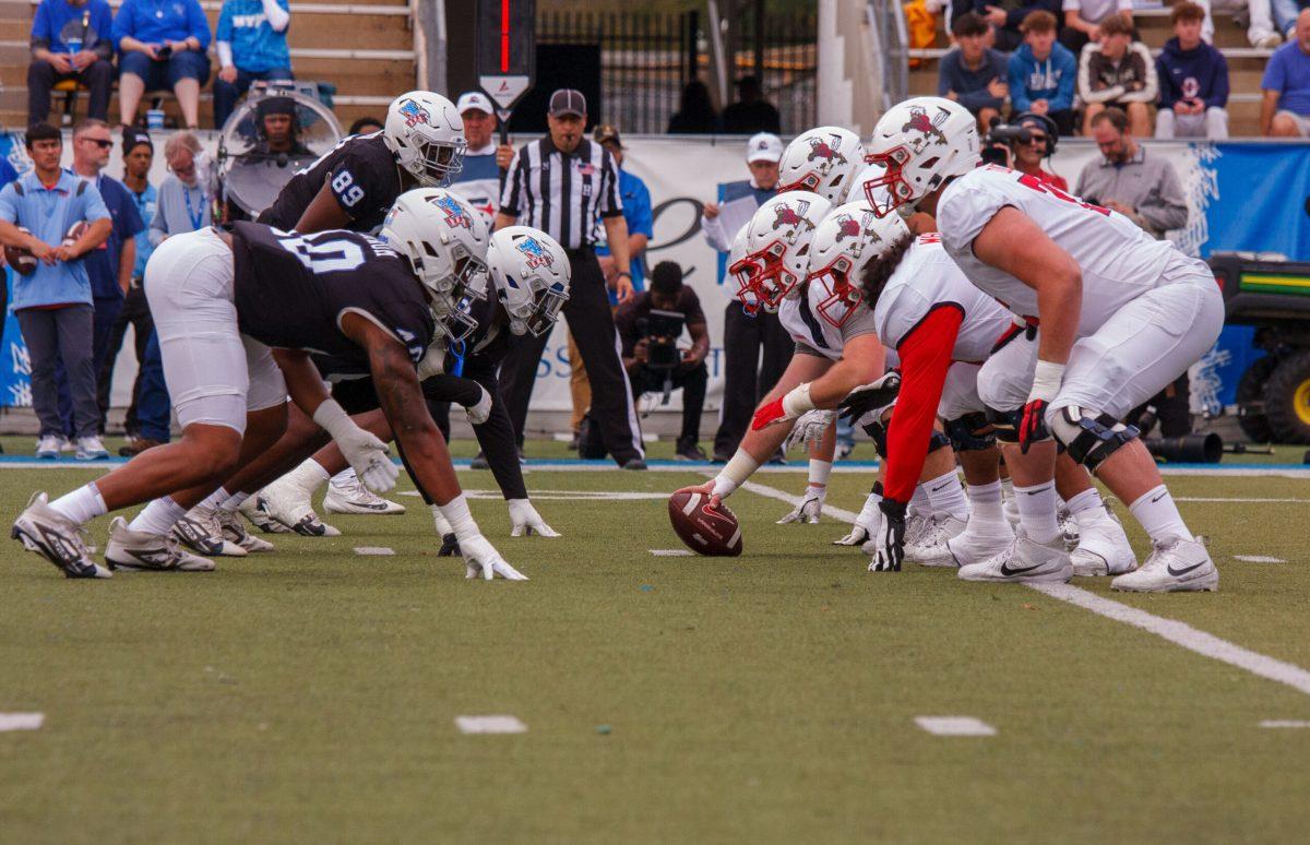 MTSU defensive line gets set against Liberty, 11-9-2024. (Photo by Paige Mast)