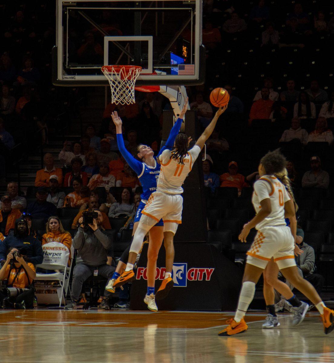 Tennessee's Zee Spearman (11) drives on Anastasiia Boldyreva, 11-12-2024. (Photo by Paige Mast)