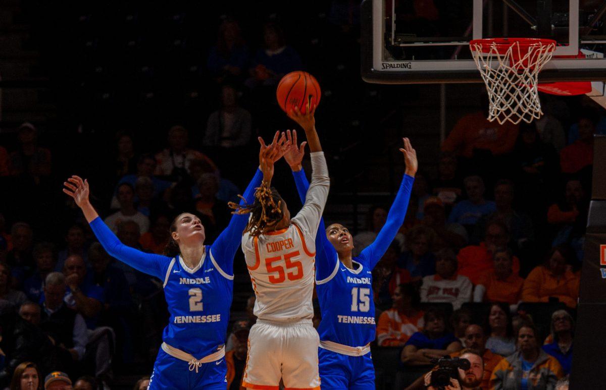 Tennessee's Talaysia Cooper (55) shooting over Anastasiia Boldyreva (2) and Ta'Mia Scott (15), 11-12-2024. 