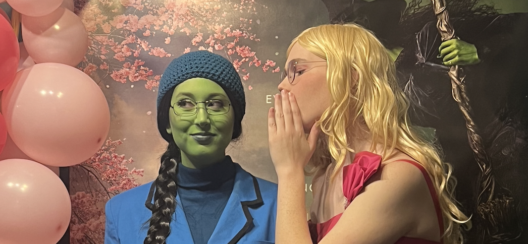 Aly Ruscianno (Elphaba) and Skye Neal (Galinda) pose together at Premiere 6 Theatre. (Photo by Emma Burden)