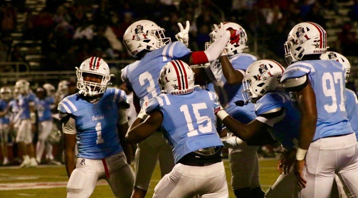 Oakland celebrates a touchdown in the first round of the playoffs against Lebanon, 11-8-2024. (Photo by Ephraim Rodenbach)