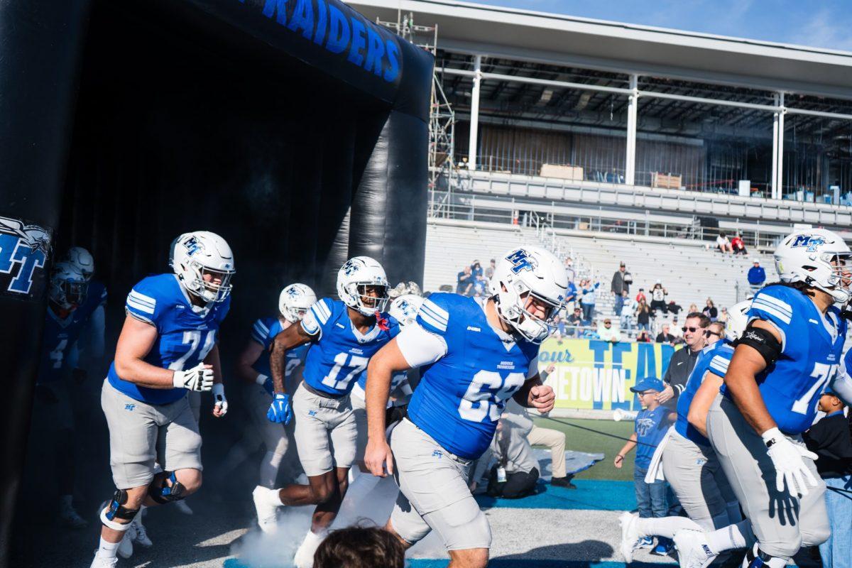 Middle Tennessee football runs out of the tunnel on Nov. 23, 2024. (Photo by Myles Valrie)