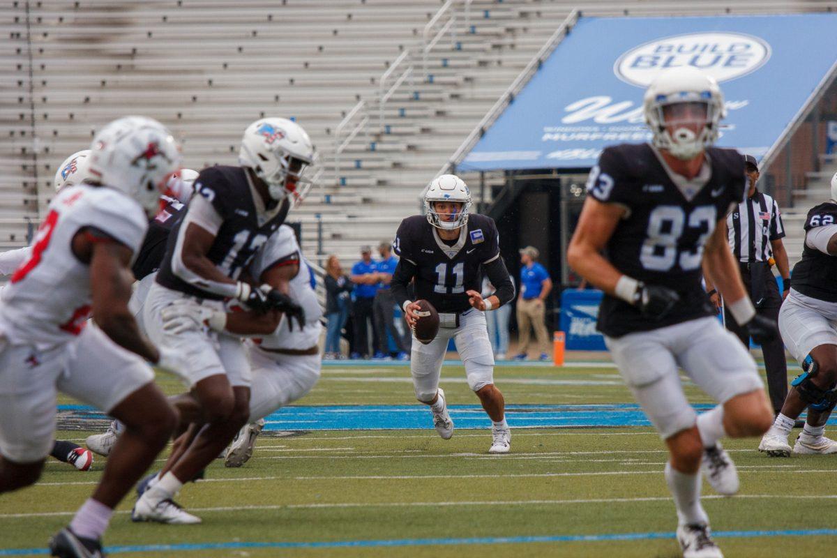 MTSU quarterback Nick Vattiato takes off against Liberty, 11-9-2024. 