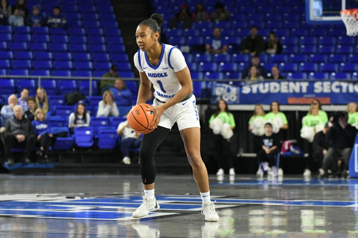 Senior guard Courtney Blakely possesses the ball against Liberty on Saturday, Jan. 4, 2025. 