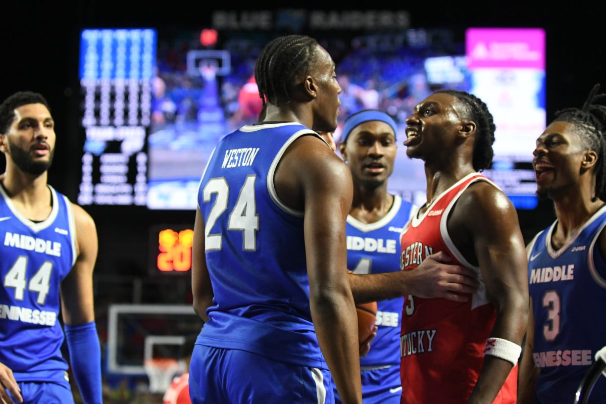 Camryn Weston (24) and Jalen Jackson (3) share words after a foul in the Murphy Center, on Jan. 18, 2025.