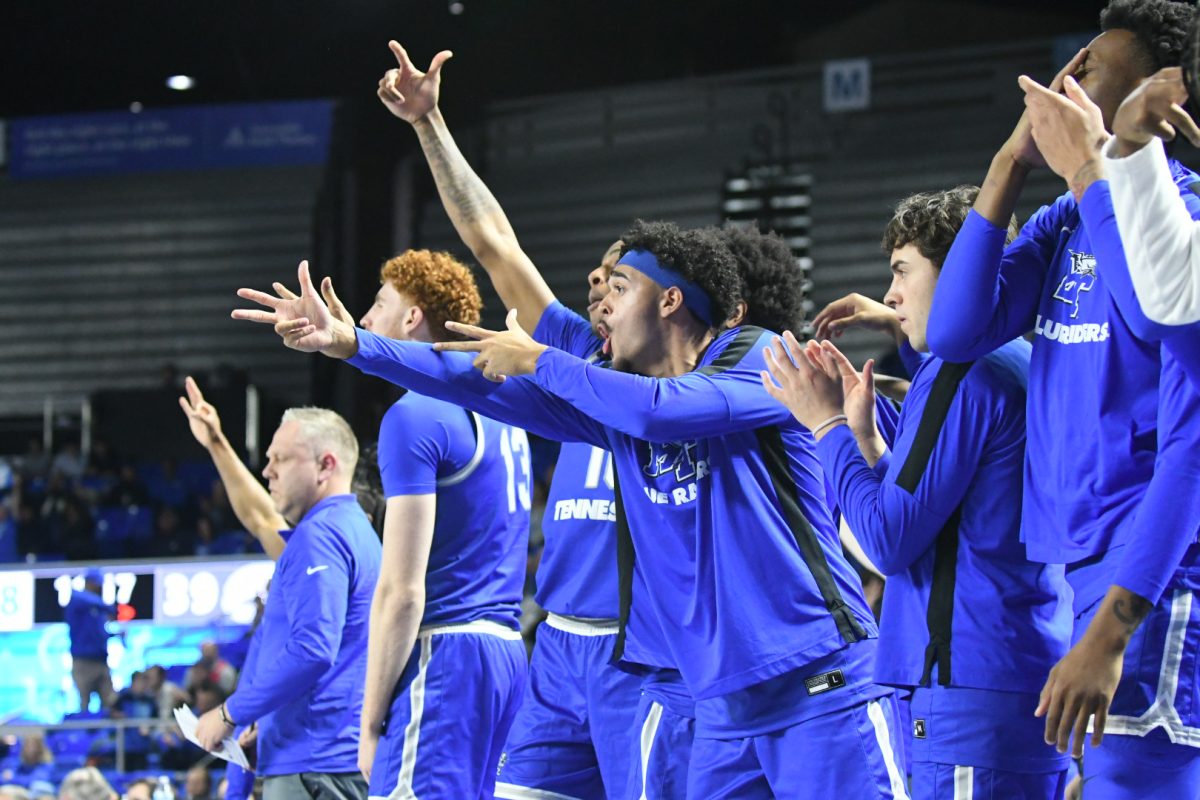 The Middle Tennessee bench celebrates a three-pointer against WKU in the Murphy Center on Jan. 18, 2025. 