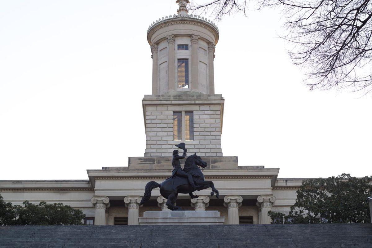 The Tenn. state capitol in Nashville sits behind a statue of President Andrew Jackson.