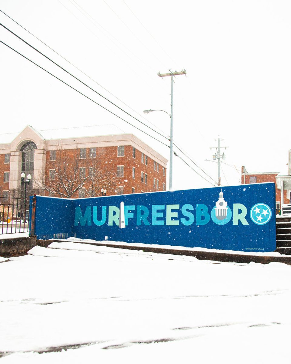 A city mural wall stands tall despite the snow in Murfreesboro, Tennessee, on Jan. 10, 2025.