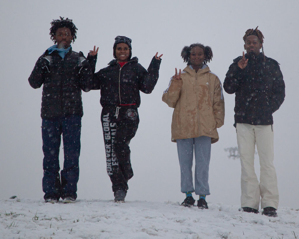 (From left to right) Friends Jamaree Jenkins, Xarya Udoumama, Miya Carthan and James Thomas Jr. pose atop a hill in Murfreesboro, Tennessee, on Jan. 10, 2025.