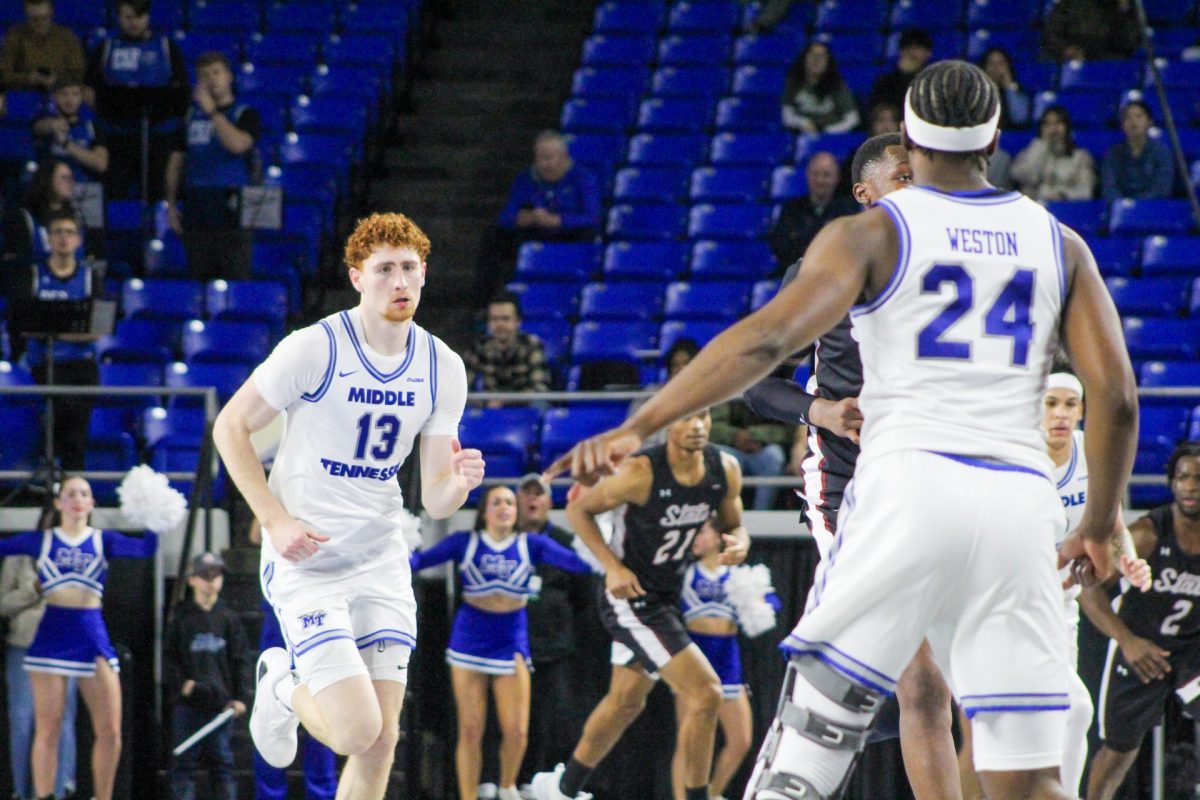 Chris Loofe sprints down court against New Mexico State in the Murphy Center on Jan. 30, 2025.