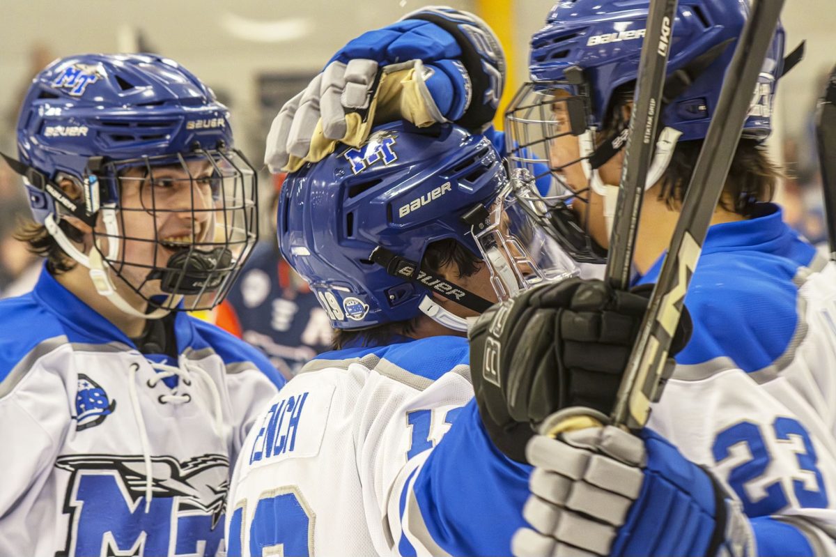 MTSU club hockey celebrates following a goal at the Ford Ice Center on Jan. 31, 2025.