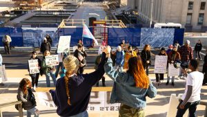 Protestors call out to others at Tennessee's capitol building in Nashville, Tennessee, on Feb. 17, 2025.