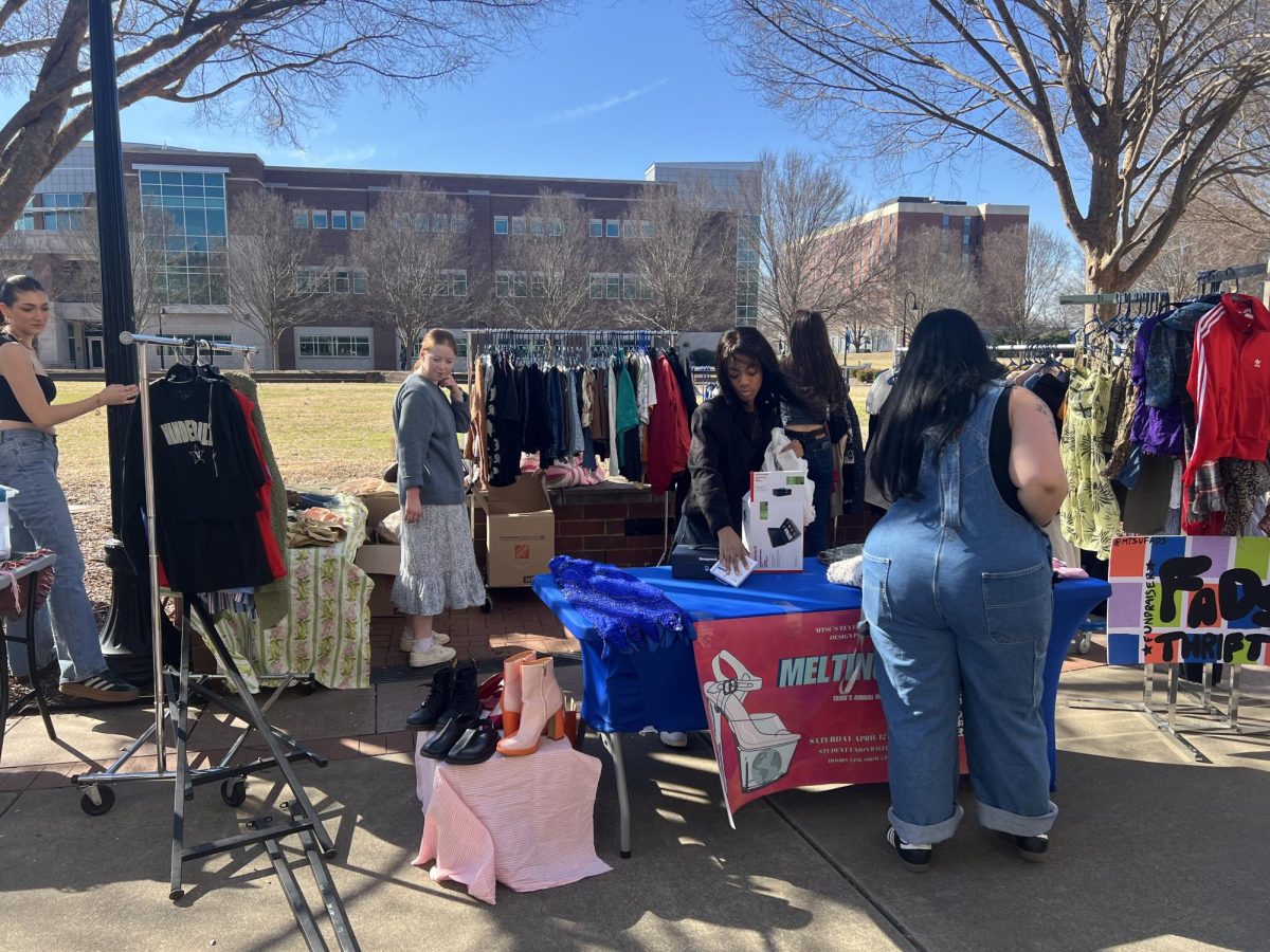 Eager shoppers peruse the FaDS pop-up thrift shop at MTSU on Feb. 26, 2025.