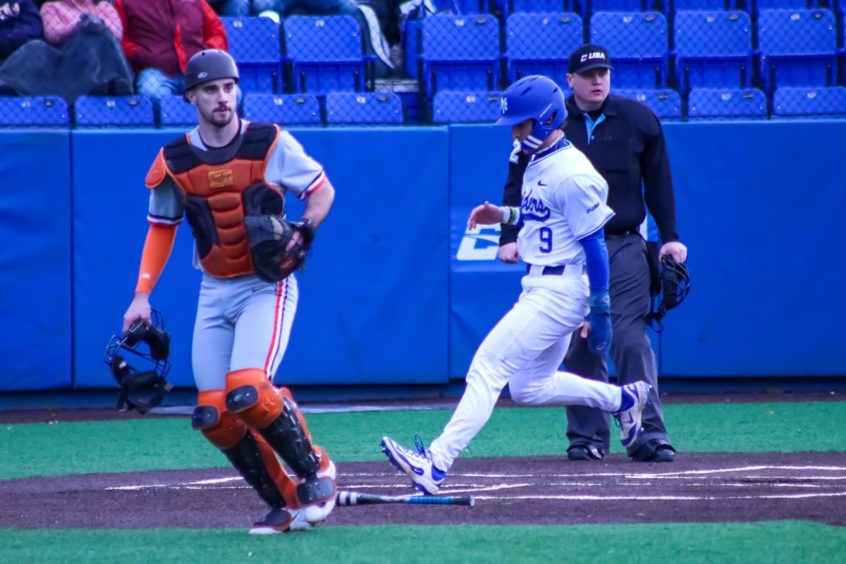 Eston Snider steps on home plate for a run against Bowling Green at Reese Smith Jr. Field on Feb. 14, 2025.