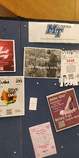 Posters on a board in the Student Union at MTSU on, Fed. 15, 2025. Photo by a member of MTSU's chapter of Democratic Socialists of American.