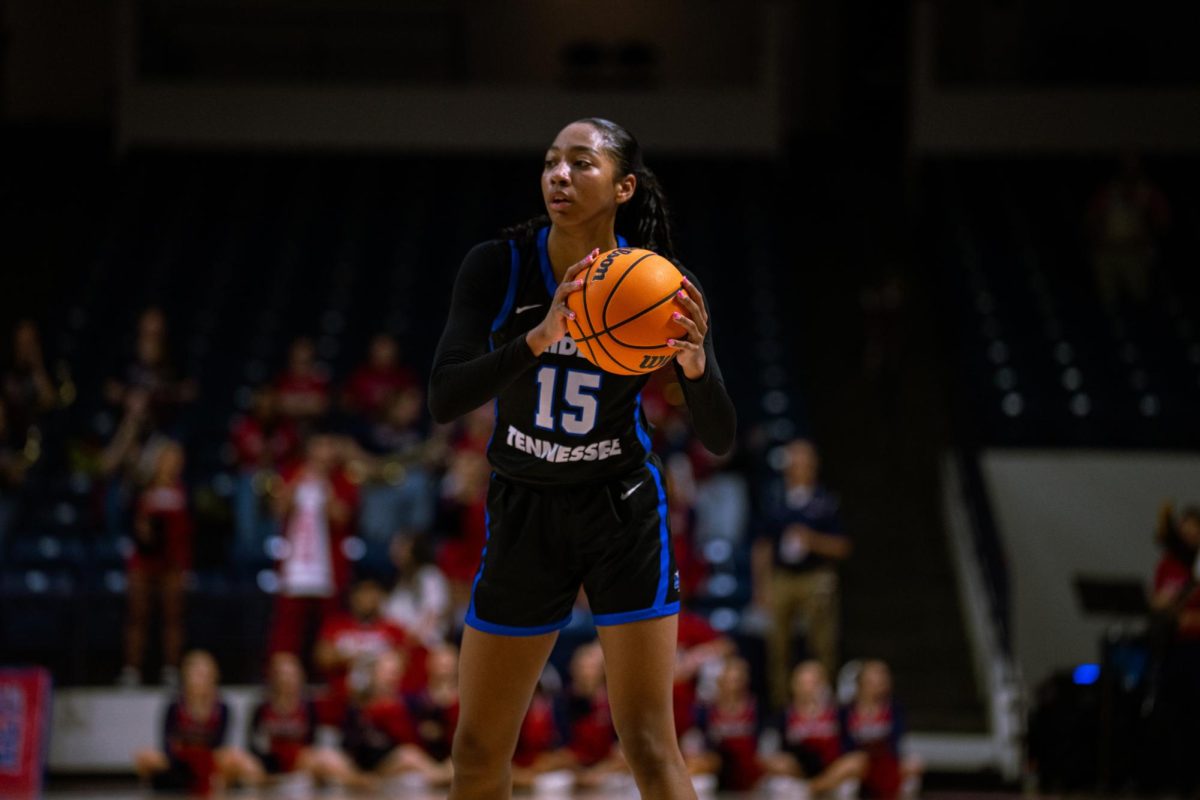 Ta'Mia Scott looks for the pass against Belmont in at Curb Event Center in Nashville, Tennessee on March 20, 2025.