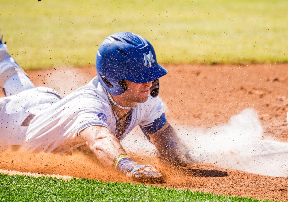 Eston Snider slides into base against UT Martin at Reese Smith Jr. Field on Feb. 28, 2025.