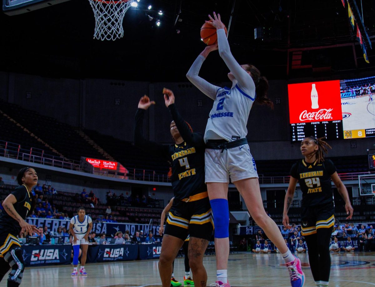 Anastasiia Boldyreva jumping for the basket at the Von Braun Center, on March 12, 2025.