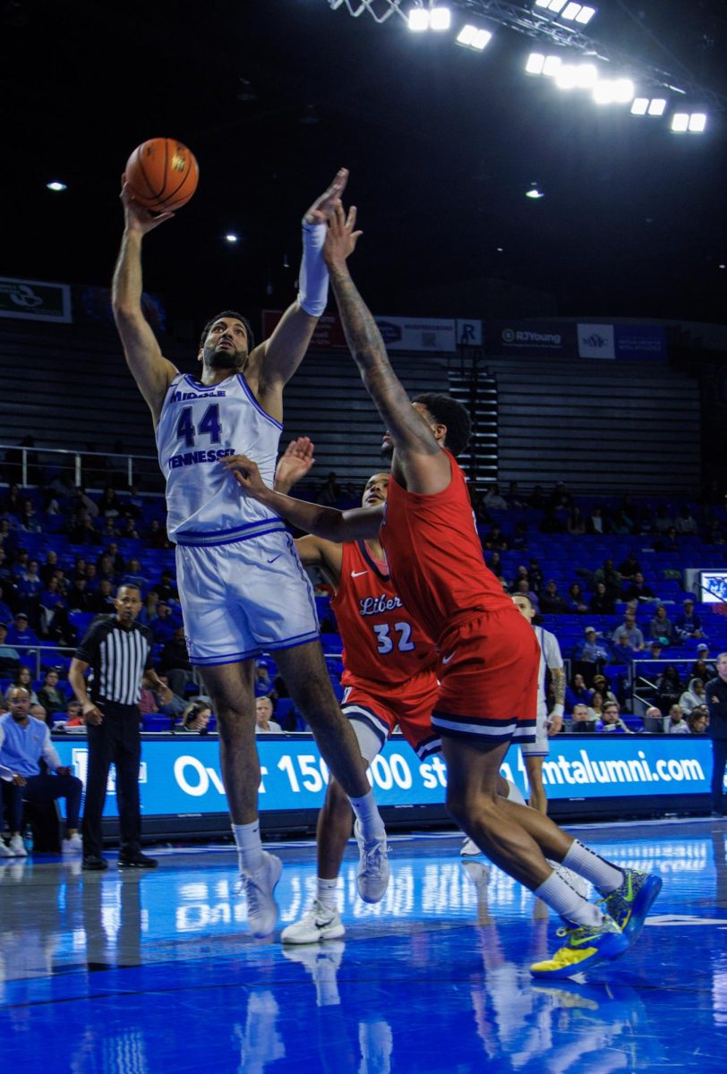 Essam Mostafa goes up for a layup against Liberty at the Murphy Center on March 6, 2025.