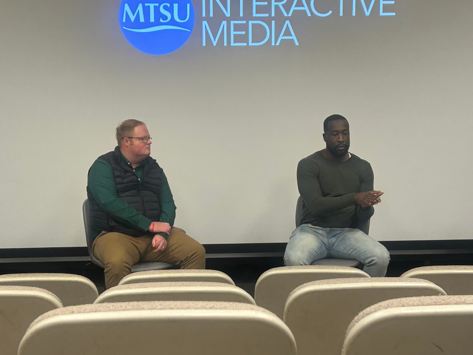 NewsChannel 5 reporters Chris Davis (left) and Levi Ismail (right) speak to students in Bragg 101 at MTSU on March 17, 2025 . 