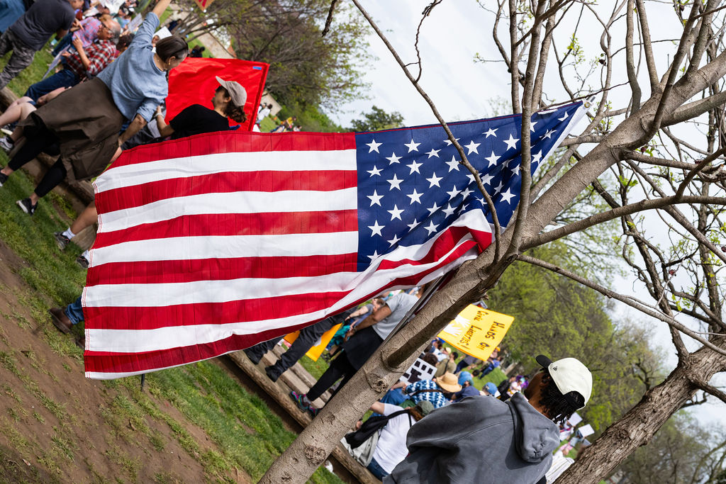 An American flag hangs from a tree in Nashville, Tennessee on April 5, 2025. 