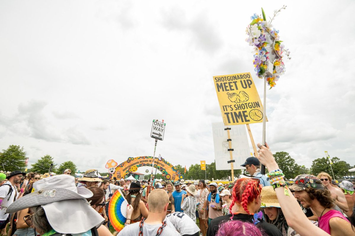 A group of Bonnaroovians count down Shotgunaroo at Bonnaroo Music & Arts Festival in Manchester, Tennessee, on June 12, 2025.