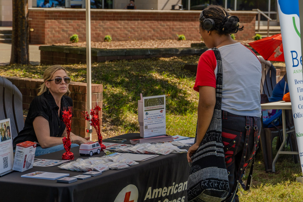 A student speaks with the American Red Cross at the MTSU V olunteer Fair
in Murfreesboro, Tennessee on Tuesday, Sept. 30, 2025
